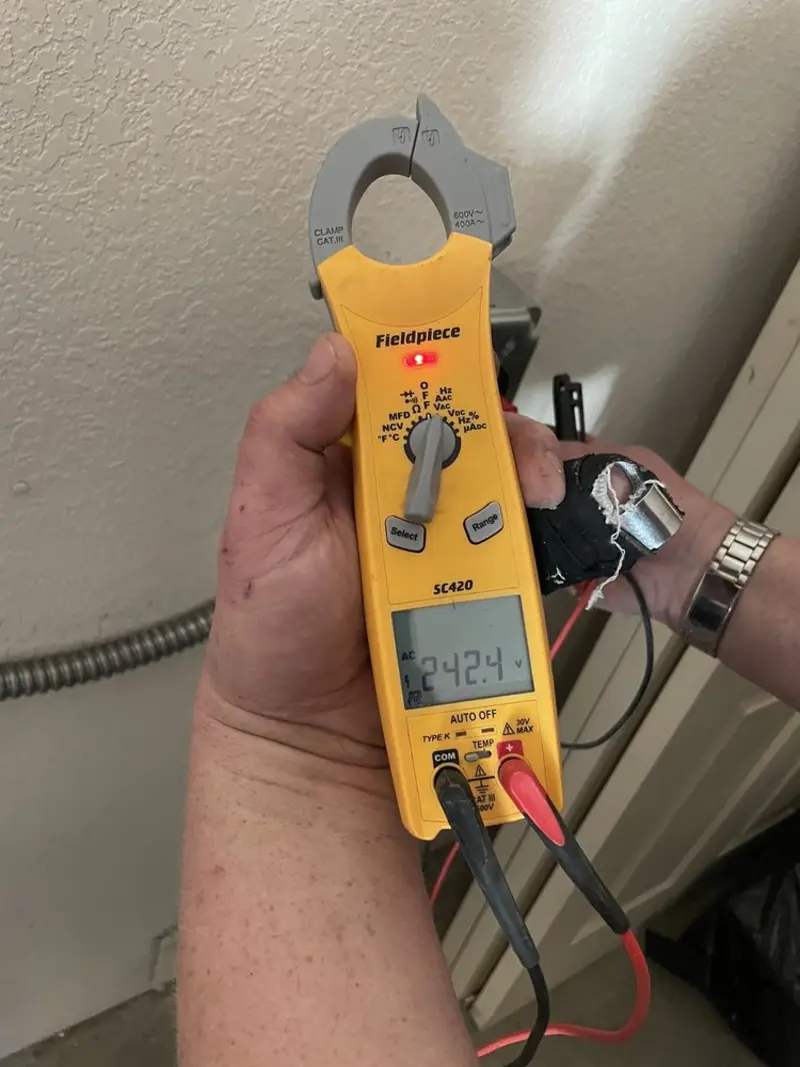 Voltage testing with clamp meter during Ceiling Fan Installation in Wyckoff